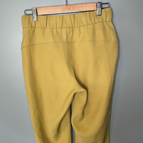 Lululemon On the Fly 7/8 Pant *Woven Vintage Gold - Picture 6 of 10